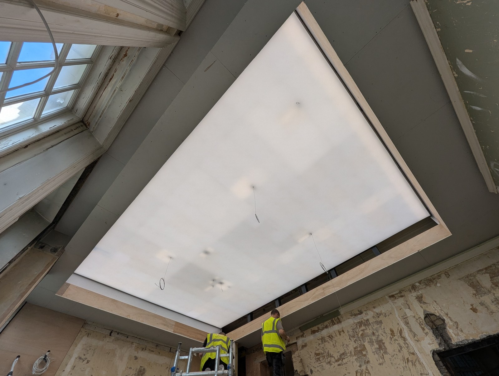 The backlit dome panel during the works