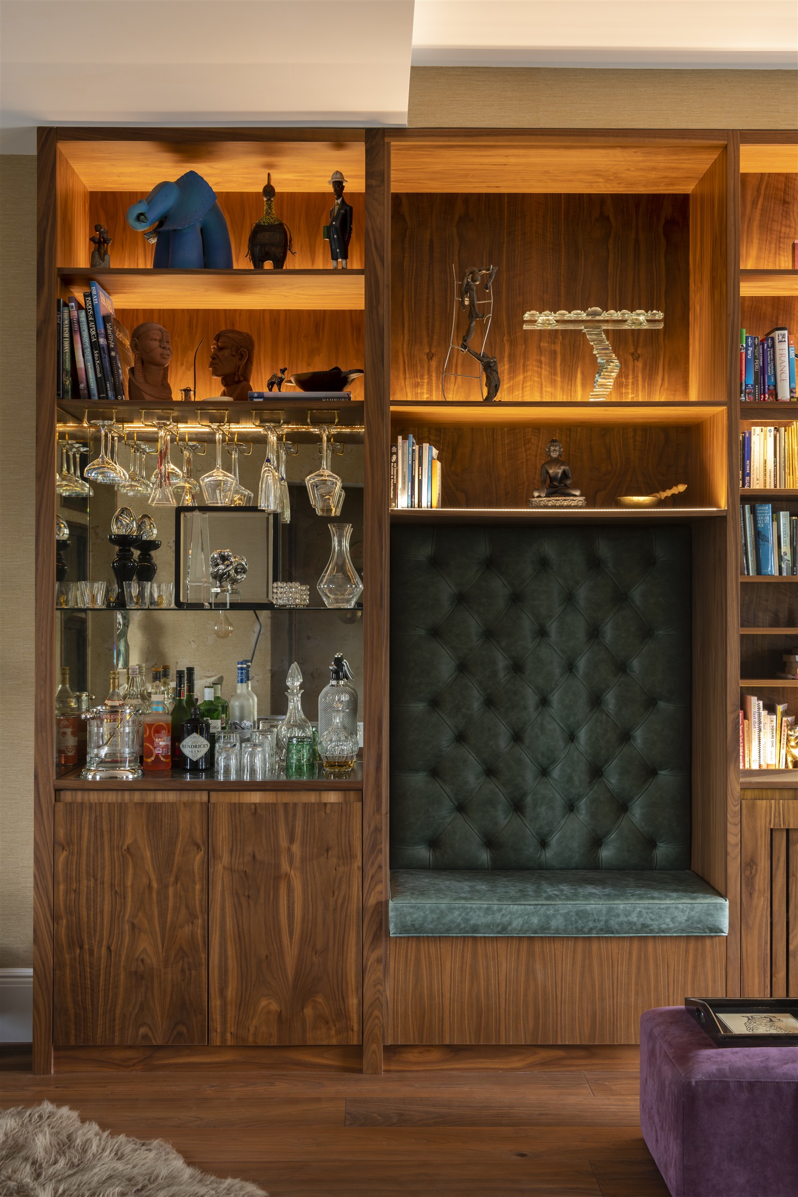 Walnut shelving, lit